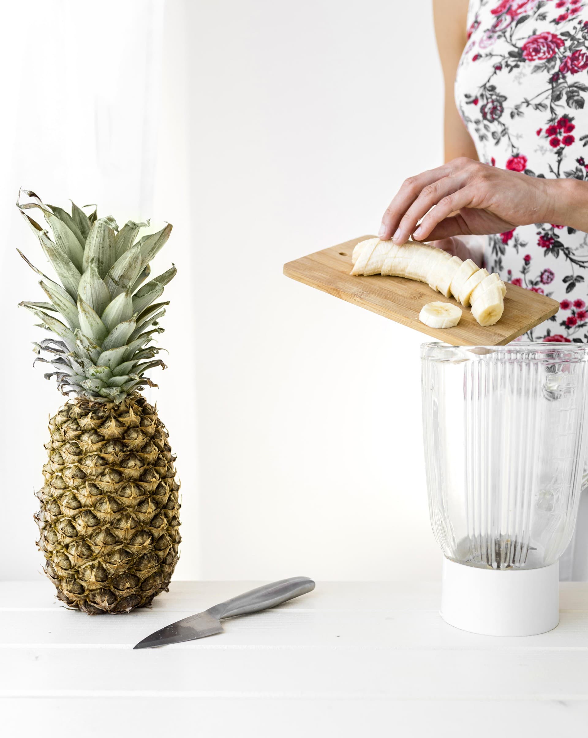 woman sliced banana front view